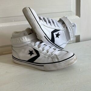 Leather hightop converse Unisex. White/black insignia.  Kids 5, Size 7 women’s